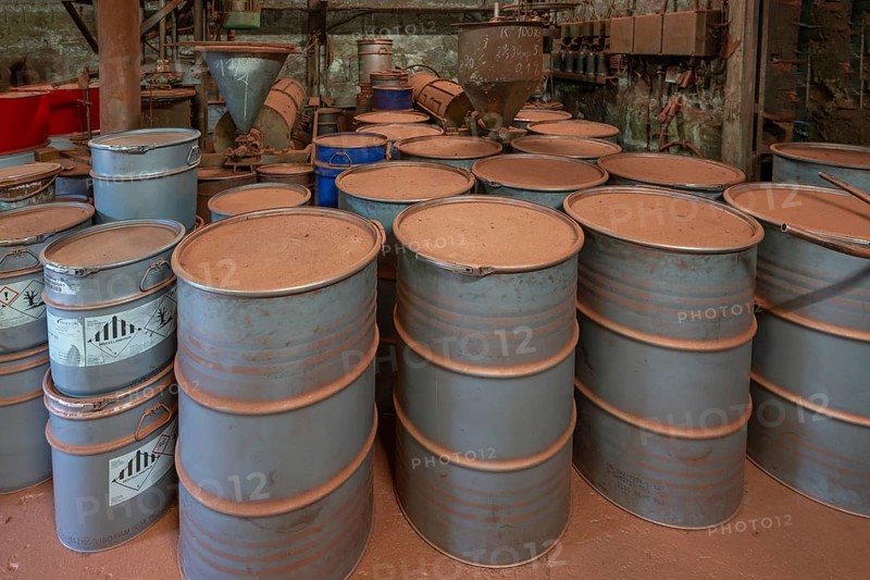Metal drums for metal powder in the bronze powder filling room of a metal powder mill, founded in 1900, Igensdorf, Upper Franconia, Bavaria, Germany, Europe