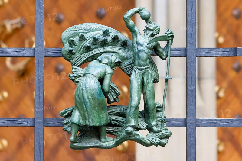 Prague castle, Gothic Metropolitan Cathedral of Saints Vitus, Wenceslas and Adalbert, Decorative figure of daily life scene on a fence, Prague, Czech Republic, Europe