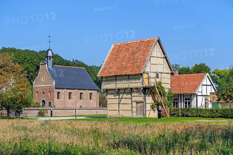 Chapel, school and 17th century spijker, granary in the recreated Hesbaye, Haspengouw village at open air museum Bokrijk, Limburg, Flanders, Belgium, Europe