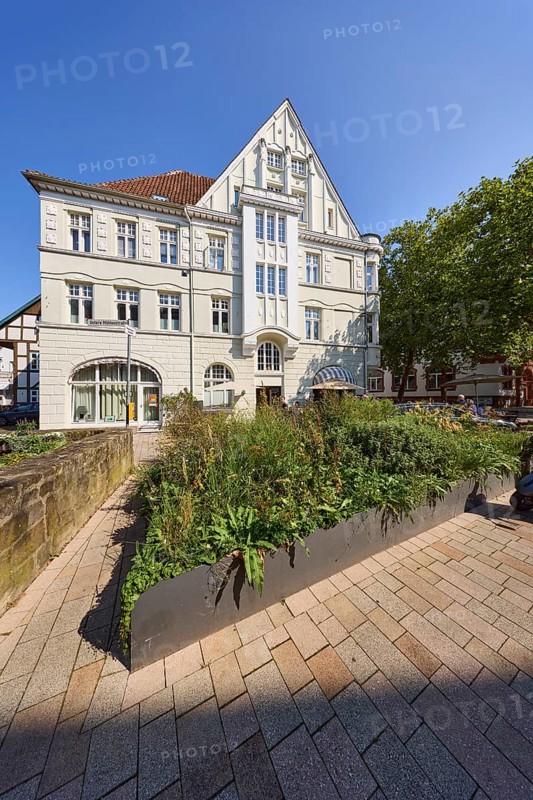 Historic building with flower bed on Untere Mühlenstraße in Bad Salzuflen, Lippe district, North Rhine-Westphalia, Germany, Europe