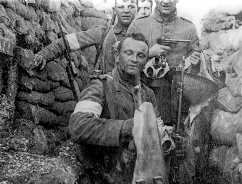 German WWI raiders with white armbands for recognition during hand-to-hand combat in trench warfare, armed with pistols during World War One, Flanders