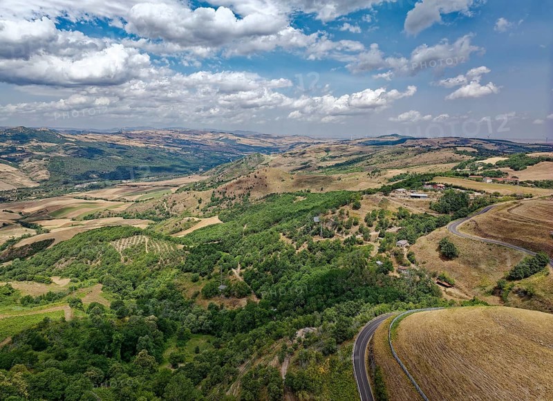 Aerial view of the varied hilly landscape of Basilicata in the north of the Italian province of Potenza. Foggianello near Melfi, Basilicata, Southern Italy, Southern Europe