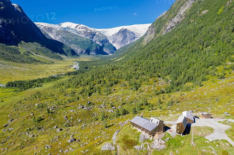Aerial view of tourist cabin Tungestølen at the glacier Jostedalsbreen, valley Langedalen in the back, Sognefjord region, Norway, Europe