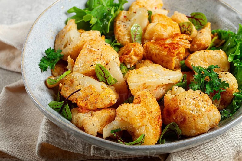 Fried cauliflower salad, with spices and herbs, homemade, no people