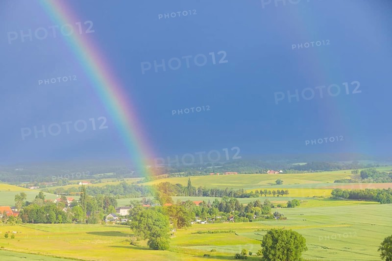 Thunderstorm cell with rainbow over fields near Krebs in the Osterzgebirge, Krebs, Saxony, Germany, Europe