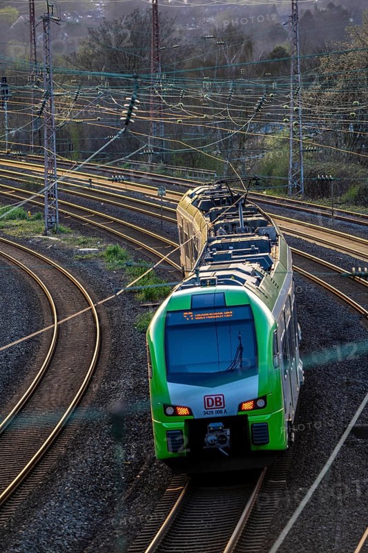 S-Bahn train on the tracks, railway layout, railway line west of the main station of Essen, North Rhine-Westphalia, Germany, Europe
