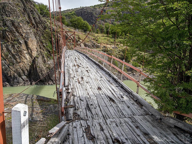 Old-style suspension bridge over Rio Mayer, on road X-905 from Villa o' Higgins to Paso Mayer, Patagonia, Chile, South America