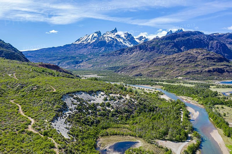 Aerial view over river Rio Tranquilo to mountain range of San Lorenzo, south of Cochrane, road X-901 leading to Calluqueo glacier tongue, Patagonia, Chile, South America