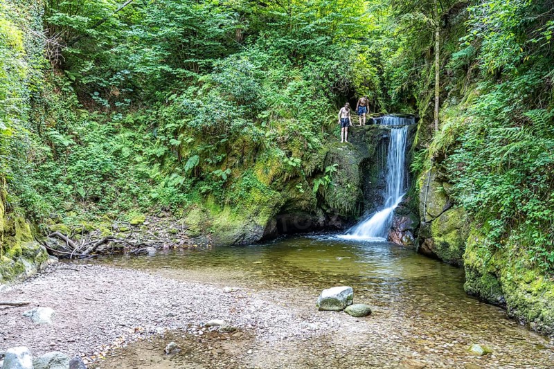 Teenagers swimming at the Geroldsau waterfall, Geroldsau, Baden-Baden, Baden-Württemberg, Germany, Europe