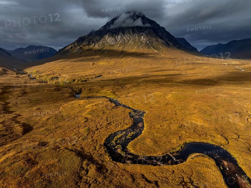 Morning light, cloudy mood, sunbeams, river, moor, mountain landscape, aerial view, autumn, view of Buachaille Etive Mòr, Glencoe, Scottish Highlands, Scotland, Great Britain