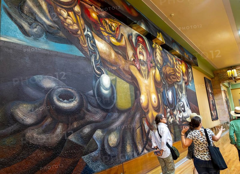 People viewing artwork 'Nueva Democracia' 1944 mural by David Alfaro Siqueiros, Palacio de Bellas Artes, Palace of Fine Arts, Mexico City, Mexico, Central America
