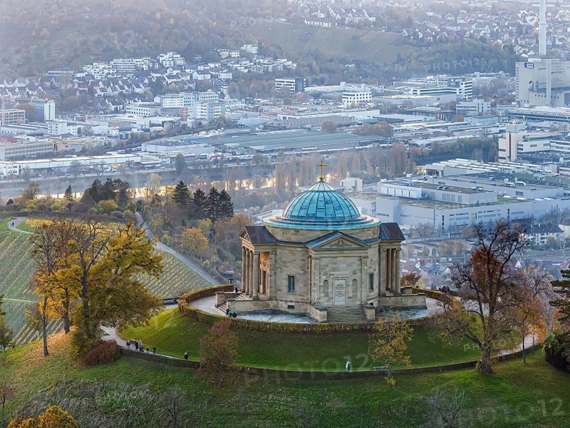 Funerary chapel on the Württenberg. The mausoleum was built between 1820 and 1824 to a design by the court architect Giovanni Salucci. Behind it is the industrial area in the Neckar valley with EnBW and the production facilities of Mercedes-Benz Group AG. Aerial view. Stuttgart, Baden-Württemberg, Germany, Europe