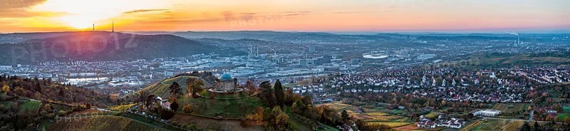 Sunset at the burial chapel on the Württenberg, aerial view, panoramic photo. The mausoleum was built between 1820 and 1824 to a design by the court architect Giovanni Salucci. Behind it, the industrial area in the Neckar valley with the Mercedes-Benz Group AG and the city centre of Stuttgart, Baden-Württemberg, Germany, Europe