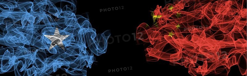 Flags of Somalia and China on Black background, Somalia vs China Smoke Flags