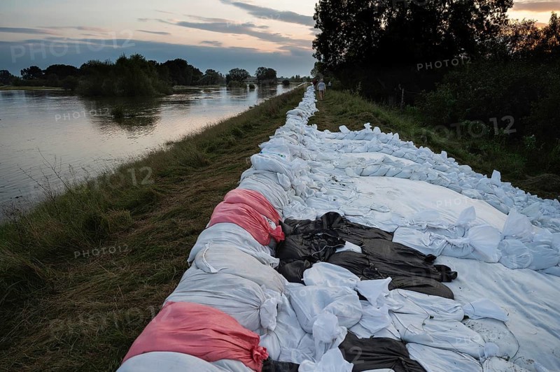 Reinforcement of river embankments with sandbags, flood risk in Poland