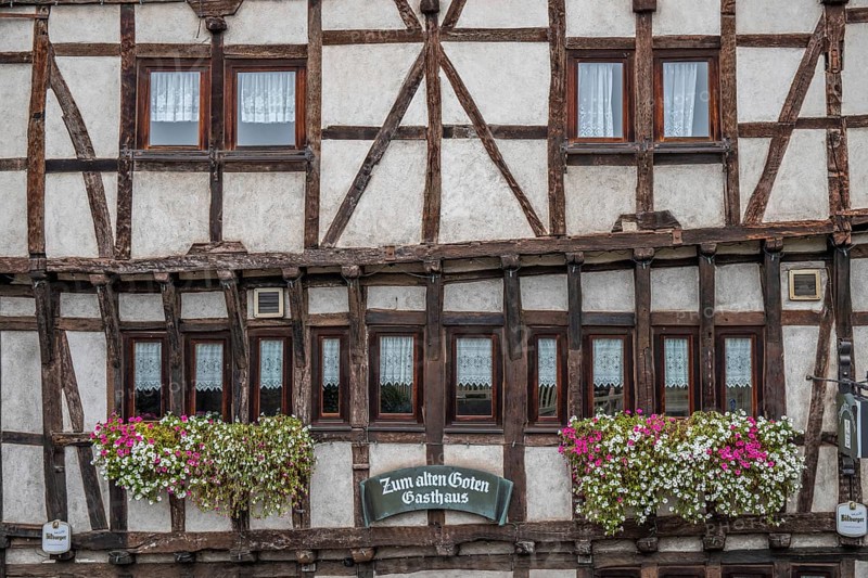 An old half-timbered town in autumn. A church was built into a rock here. Unique German architecture. Foggy landscape in the morning at the rock church, Idar-Oberstein, Rhineland-Palatinate, Germany, Europe