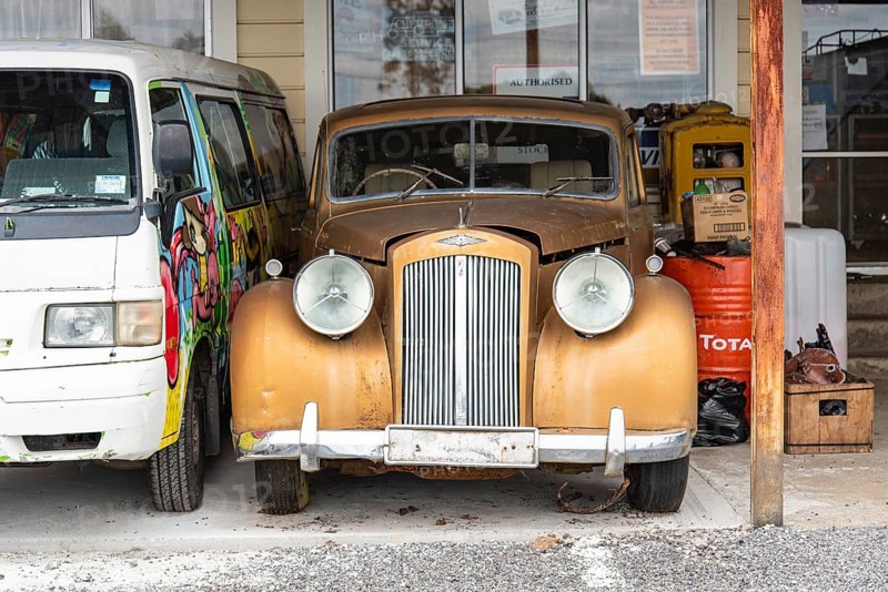 OHAKUNE, NEW ZEALAND, DECEMBER 23, 2022, Antique cars on a big scrapyard at the end of Old Coach Road Trail, North Island of New Zealand