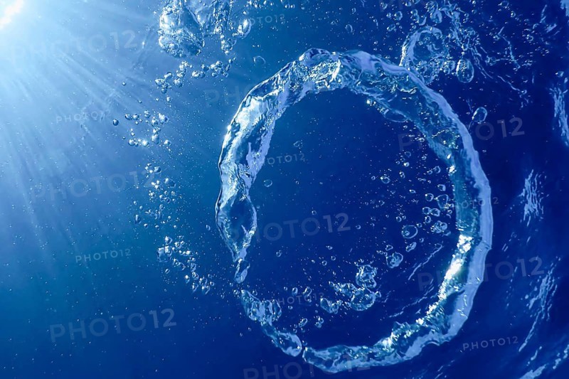Underwater Bubble Ring Ascends towards the Sun