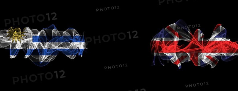 Flags of Uruguay and United Kingdom on Black background, Uruguay vs United Kingdom Smoke Flags