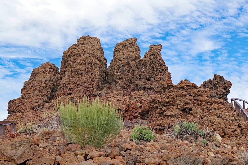 Brown rocks rise into a cloudy desert landscape, Roques de los Muchachos, La Palma, Canary Islands, Spain, Europe