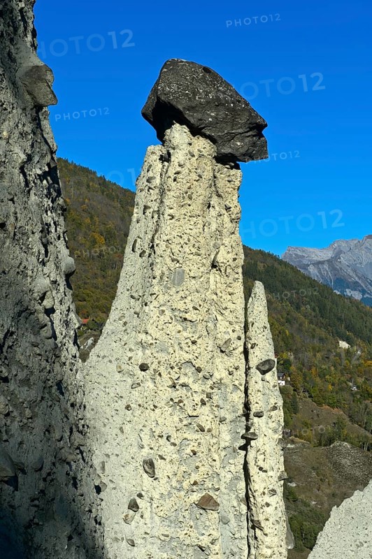 Earth pyramids of Euseigne with cairn, Hérémence, Hérens Valley, Val d'Hérens, Valais, Switzerland, Europe