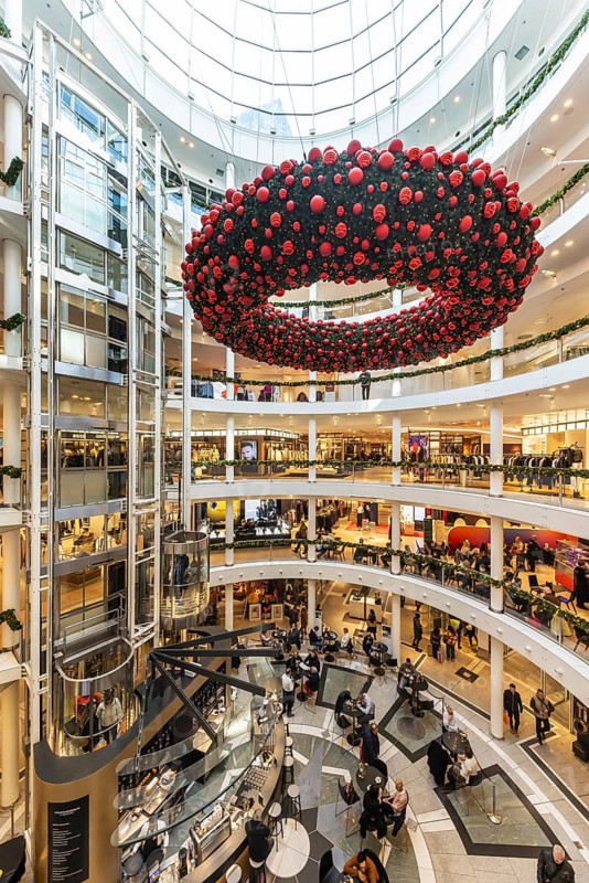 Breuninger department stores' during the Advent season, interior shot with Advent wreath. Stuttgart, Baden-Württemberg, Germany, Europe