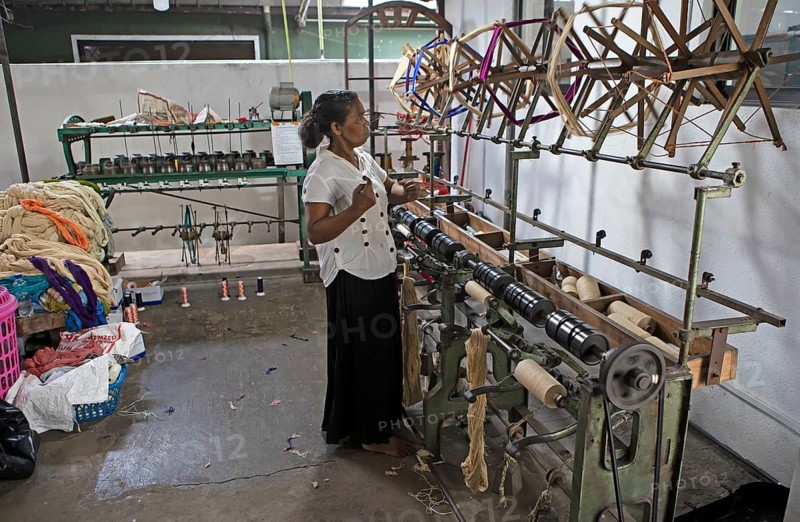 Sri Lankan woman in a weaving mill, Selyn Textiles, Kurunegala, North West Province, Sri Lanka, Asia