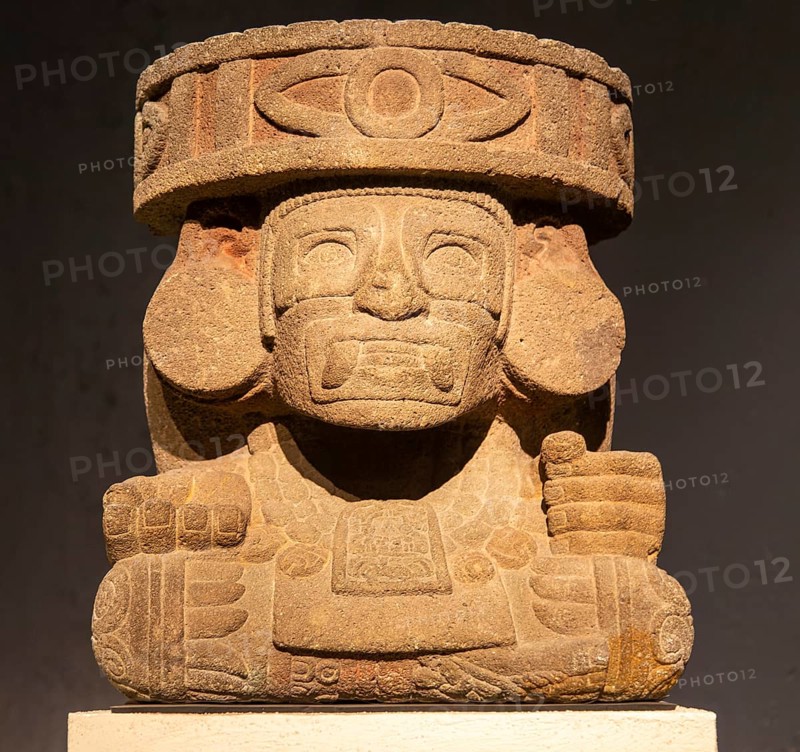 Carved stonework block depicting a masked God, archaeological site and museum of Templo Mayor, Mexico City, Mexico, Central America