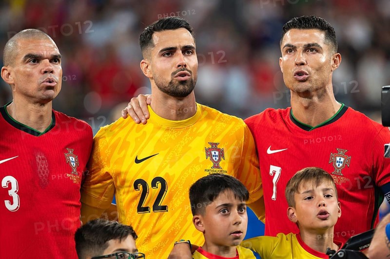 LEIPZIG, GERMANY - JUNE 18, 2024: Euro 2024 Groupe F match Portugal vs Czechia 2:1. Pepe (L) goalkeeper Diogo Costa and Cristiano Ronaldo (R).