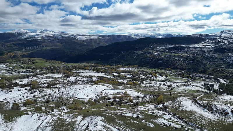 Scenic mountain vista with snow patches on fields and a cloudy sky. Posof, Ardahan, TURKEY