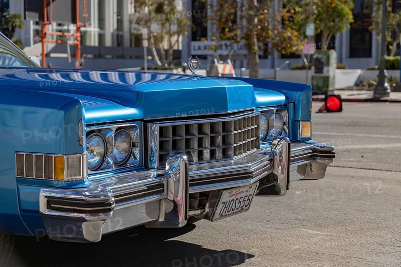 A picture of the front side of a light blue Cadillac Eldorado