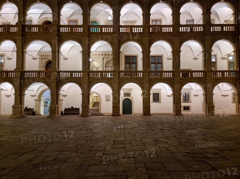 The arcaded inner courtyard of The Styrian Armoury (Landhaus building), a masterpiece of the Italian Renaissance, by night, in Graz, Steiermark, Austria, Europe