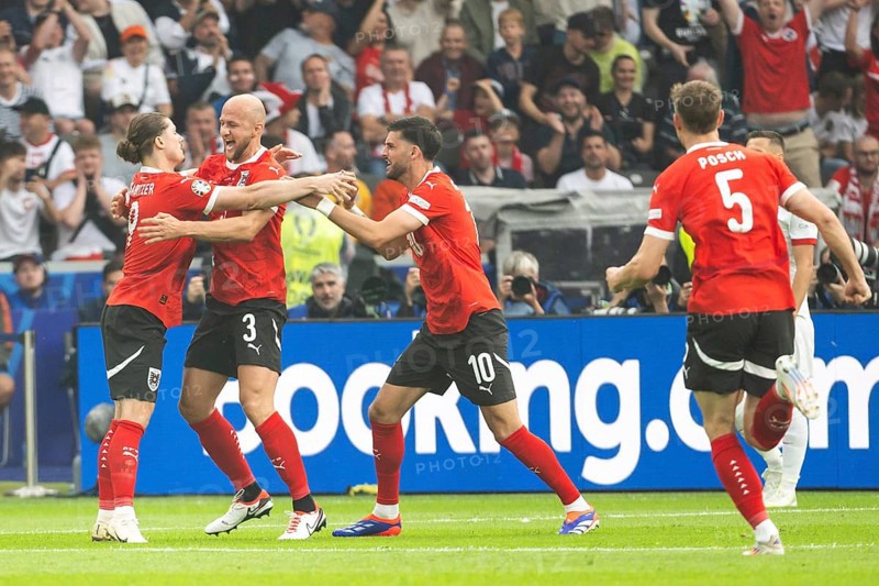 BERLIN, GERMANY - JUNE 21, 2024: Euro 2024 Groupe D match Poland vs Austria 1:3. Team of Austria Marcel Sabitzer (L) Gernot Trauner (M) Florian Grillitsch (R) joy after score the goal.