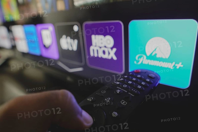 In this photo illustration the Paramount Plus, HBO Max and Apple TV logo is displayed on a TV screen