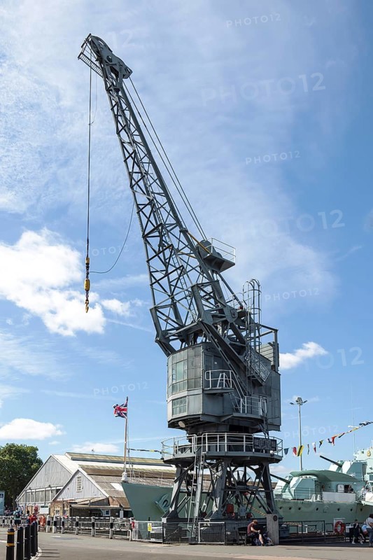 CHATHAM, KENT, UK, AUGUST 9. View of an old dockyard crane in Chatham, Kent, UK on August 09, 2024. Unidentified people