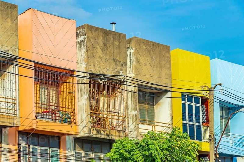 Colorful shabby old and dirty apartments in Don Mueang Bangkok Thailand