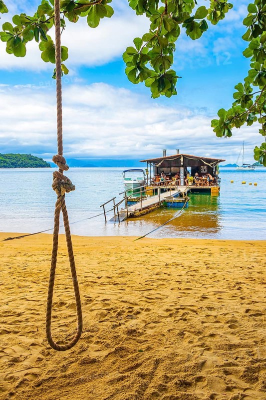 Ilha Grande Brazil 23. November 2020 Amazing Mangrove beach and Pouso beach with swimming restaurant and boats big tropical island Ilha Grande Brazil