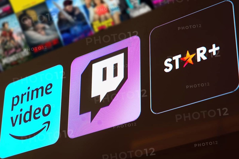 In this photo illustration the Amazon Prime Video, Twitch and Star Plus logo is displayed on a TV screen