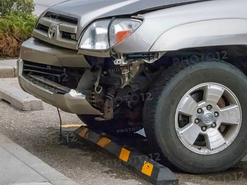 Calgary, Alberta, Canada. May 25, 2024. A close up to a car with a bumper damage after a crash accident