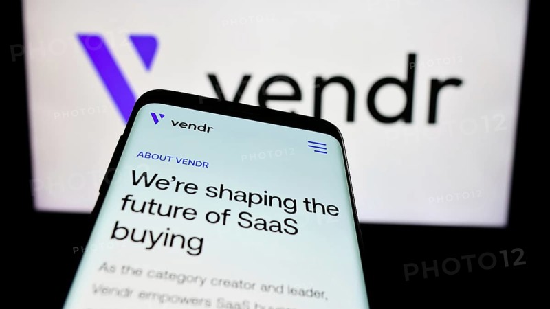 Stuttgart, Germany, 04-02-2024: Mobile phone with website of US software procurement company Vendr Inc. in front of business logo. Focus on top-left of phone display, Europe