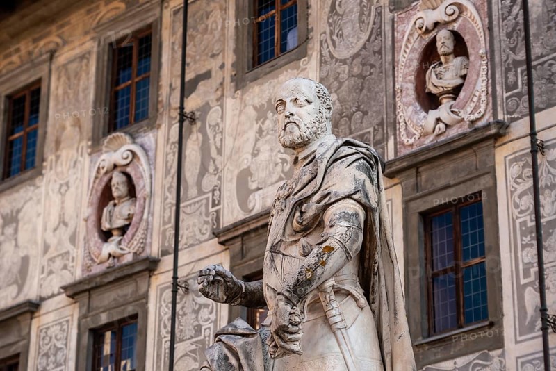 Rich ornate facade of the Palazzo della Carovana in the center of Pisa, Italy, Europe