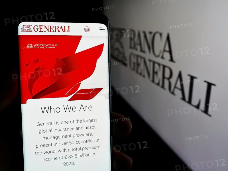 Stuttgart, Germany, 06-01-2024: Person holding smartphone with web page of Italian financial services company Banca Generali S.p.A. with logo. Focus on center of phone display, Europe