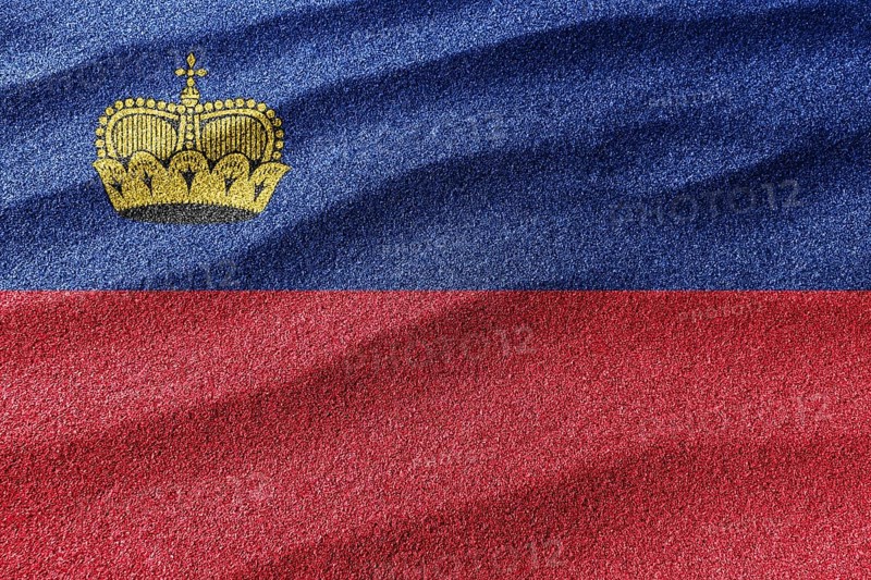 Liechtenstein sand flag, national flag sand background