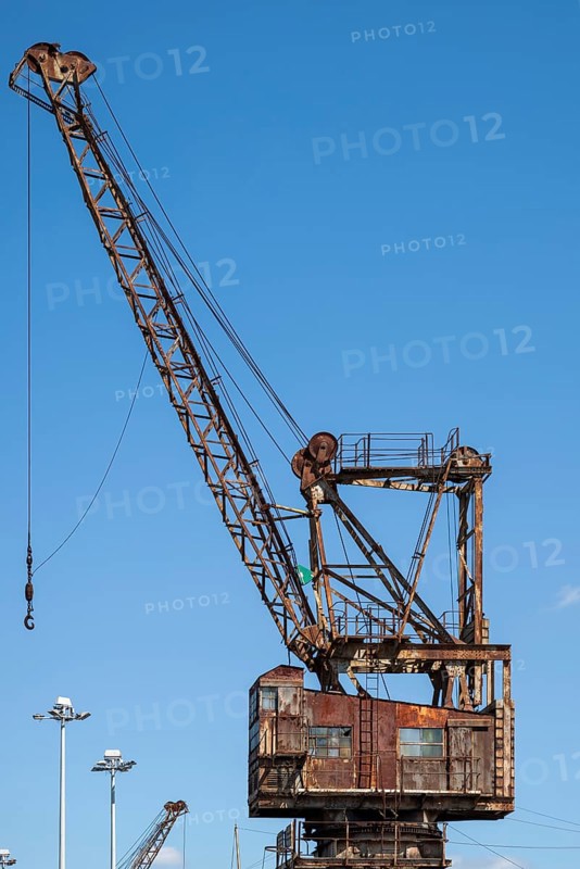 CHATHAM, KENT, UK, AUGUST 9. View of an old dockyard crane in Chatham, Kent, UK on August 09, 2024