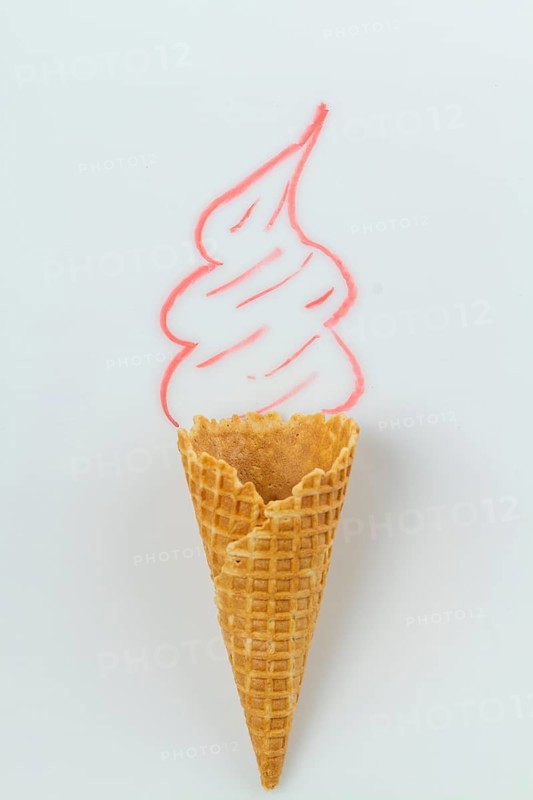 Ice cream with real waffle cone and hand drawn cream. Vertical shot white background