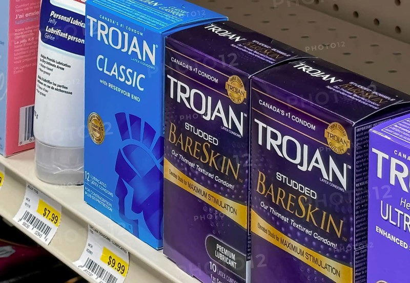 Calgary, Alberta, Canada. Oct 17, 2023. A few boxes of Trojan Condoms at a store. A brand name of condoms and sexual lubricants manufactured by the Church and Dwight Company