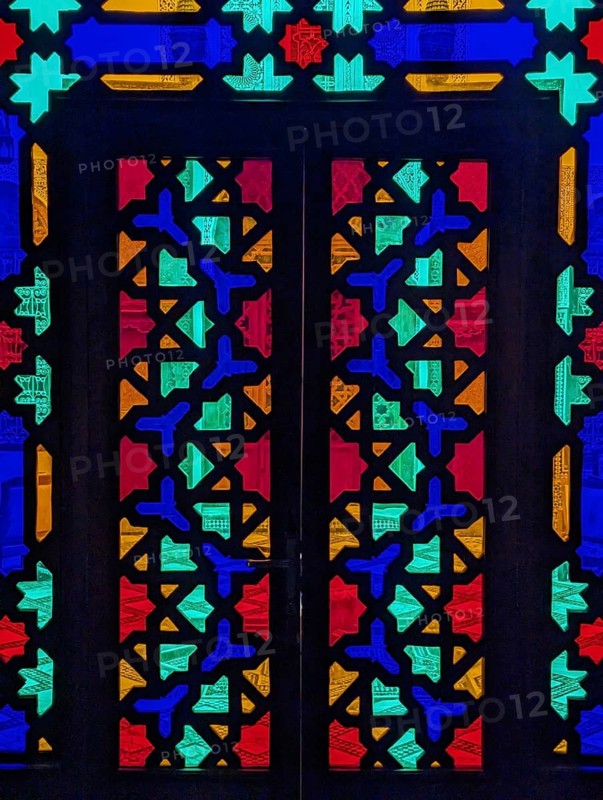 Traditional window mosaic in an oriental Moroccan palais