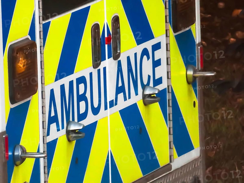Calgary, Alberta, Canada. Oct 8, 2023. A close up to the back of an Emergency 911 vehicle showing the text Ambulance