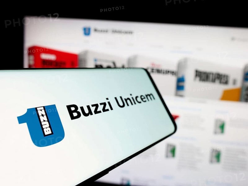 Stuttgart, Germany, 06-01-2024: Cellphone with logo of Italian building materials company Buzzi Unicem SpA in front of business website. Focus on left of phone display, Europe