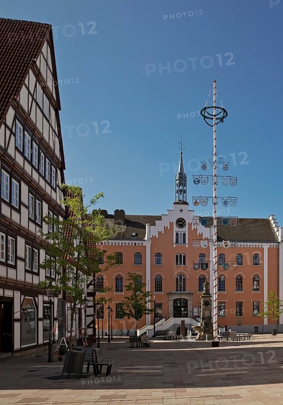 Market square with maypole and town hall in the historic old town with many half-timbered houses, Hofgeismar, Hesse, Germany, Europe